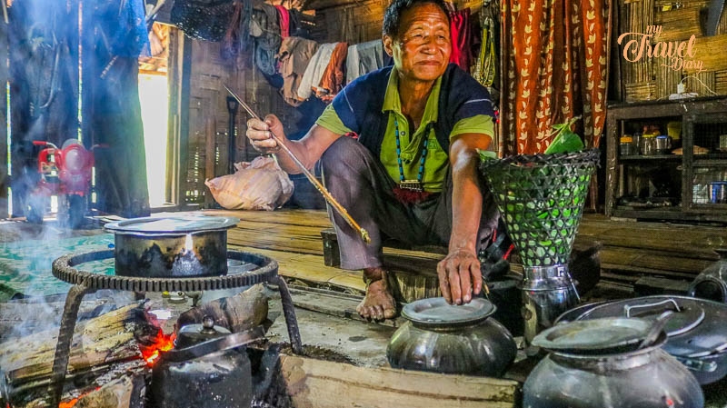 Adi Man during cooking in Ledum Village, Arunachal Pradesh