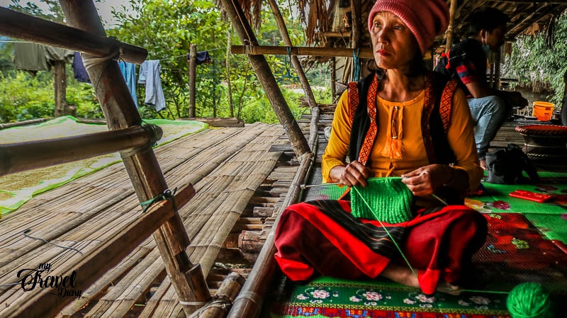 Adi woman in her house in Ledum Village_Arunachal Pradesh