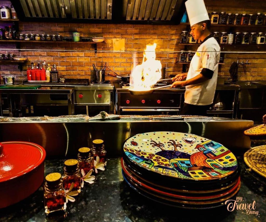 Chef at Jungle Grill busy cooking