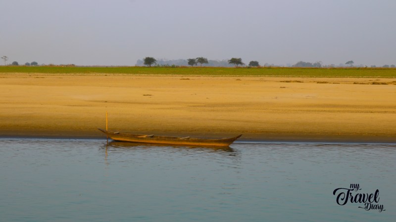 A lonely boat adding to the serenity of the landscape of Majuli