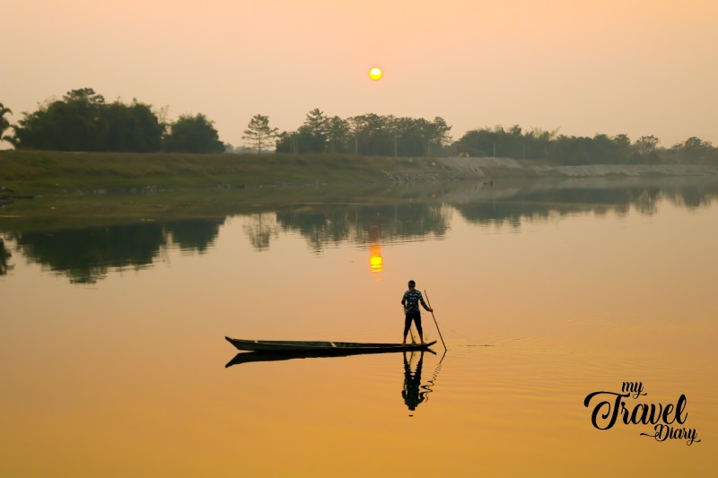 A fisherman returning home, Majuli, Assam