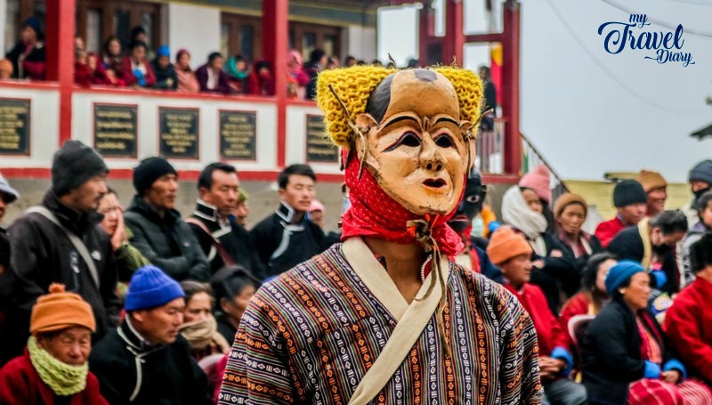 Monk wearing mask during Torgya Festival, Arunachal Pradesh. Attending Torgya Festival is one of the offbeat experiences in Tawang, Arunachal Pradesh