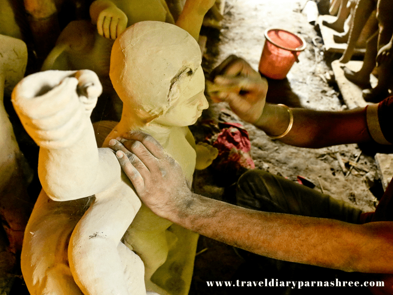 Artist giving finishing touches